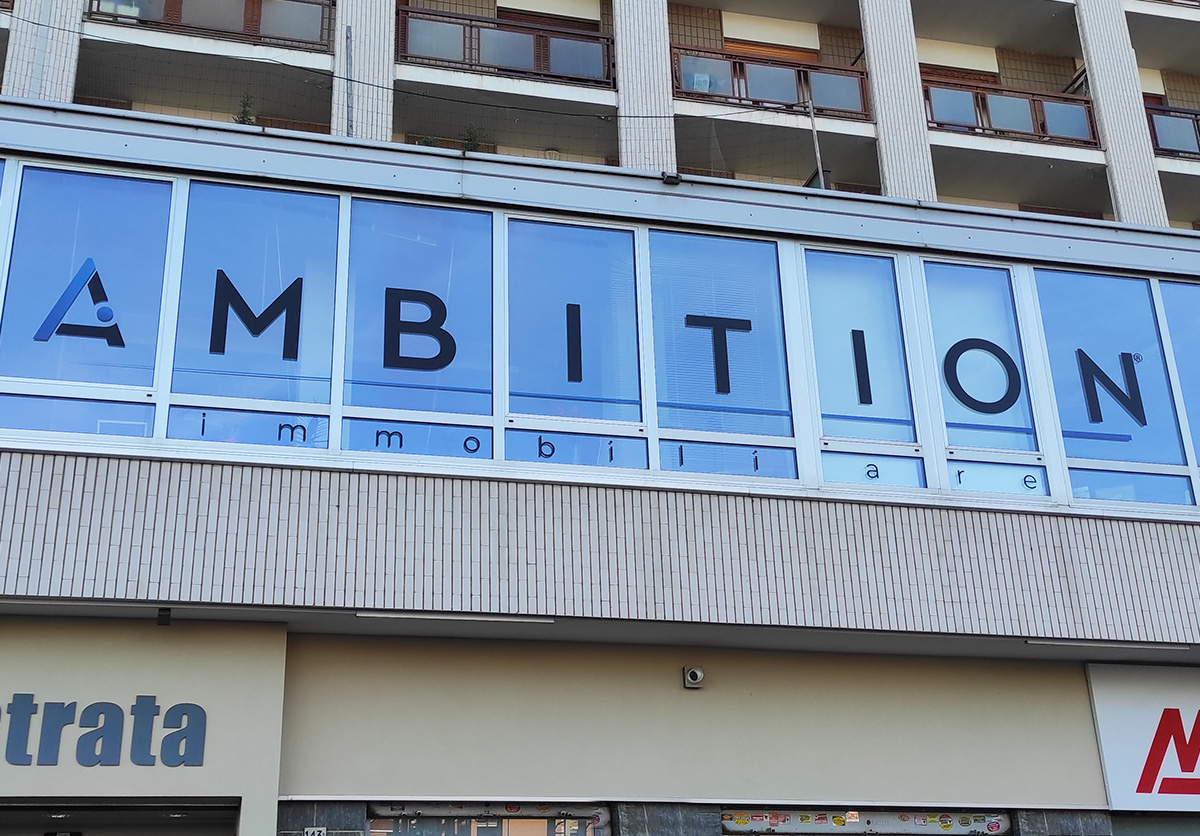 Insegne a Collegno Ambition